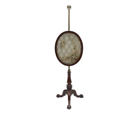 Victorian mahogany pole screen with elaborate oval embroidered textile banner, in glazed frame adjusting on brass pole with e