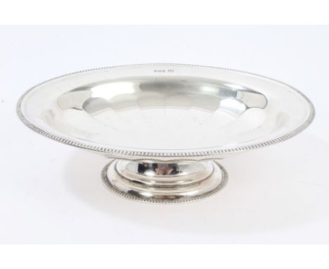 1930s silver fruit bowl of oval form, with faceted decoration and gadrooned border, on an oval pedestal foot (Sheffield 1933)