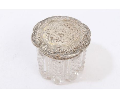 George IV cut glass dressing table pot with fine quality silver gilt slip-on cover with cast floral border and engraved armor