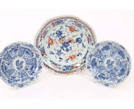 Early 18th century Chinese Imari palette octagonal pudding dish, 18cm and two early 18th century blue and white saucers with 