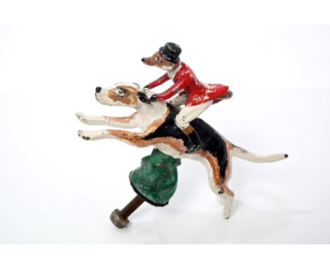 Louis Lejeune cold-painted car mascot in the form of a fox in hunting attire, riding a hound, L. L. maker's mark to base, 13c