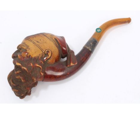 19th century meerschaum pipe carved with a Turk's head in cap with amber mouthpiece, in fitted case, 20cm