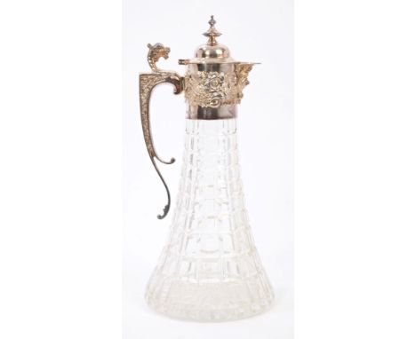 Contemporary silver mounted hobnail cut glass claret jug of tapering form, the mount with raised rococo shell and floral deco