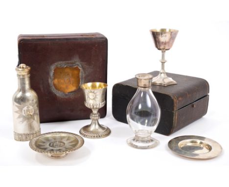 George V silver three piece communion set with chalice, paten and glass wine container in a fitted case (London 1915), maker 