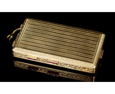 1920s ladies' Austro-Hungarian gold compact, the rectangular case with engine-turned stripes and Greek key border, each thumb