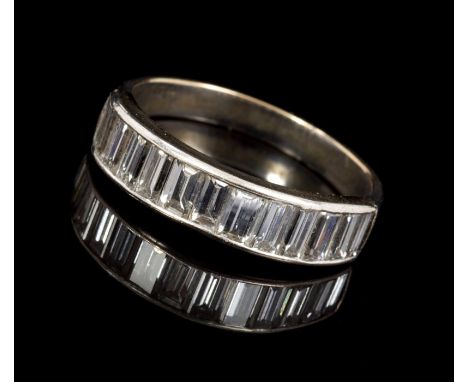 Art Deco-style diamond half eternity ring, the band with a row of baguette cut diamonds in channel setting, on plain tapered 