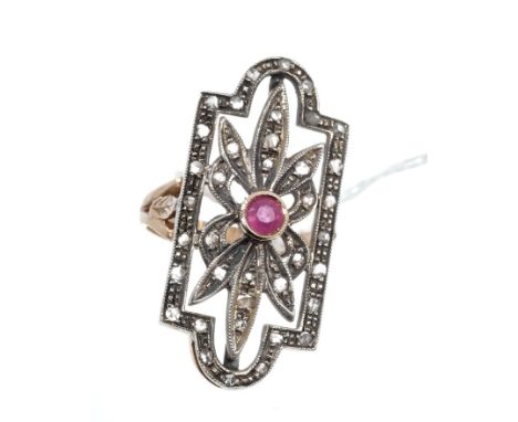 Art Deco-style ruby and diamond cocktail ring with an openwork plaque centred with a ruby and set throughout with rose cut di