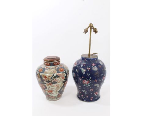 Late 19th / early 20th century Chinese export baluster-shaped vase with enamel butterfly and floral decoration on blue and gi