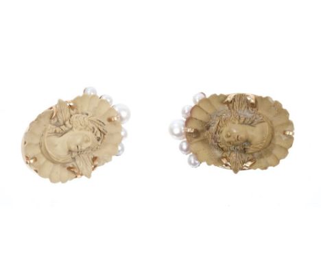 Pair Italian carved lava cameo ear clips, each oval panel carved in high relief depicting classical female busts, on scallope