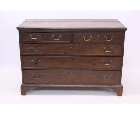 George III oak chest of drawers with moulded top and two short over three long drawers, on bracket feet, 130cm wide x 57cm de