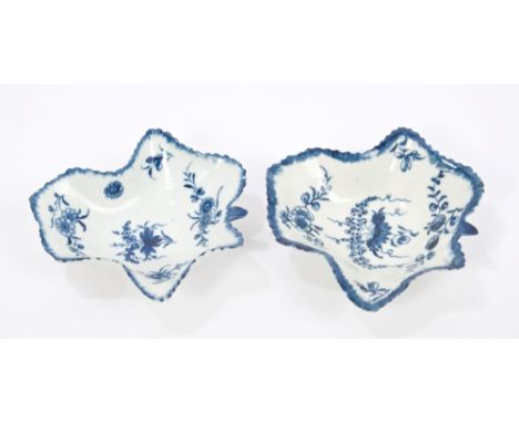 Two 18th century Worcester blue and white leaf-shaped pickle dishes with painted floral and vine decoration and moulded veins