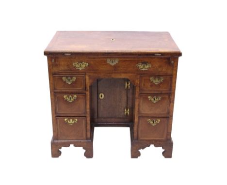 Highly unusual George II walnut crossbanded and line-inlaid estate desk with hinged fold-over moulded top enclosing interior 