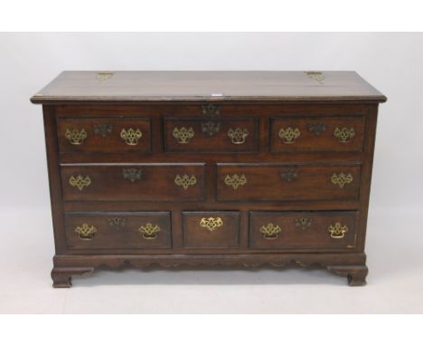Mid-18th century and later oak and walnut crossbanded mule chest with hinged lid and four-drawer front over three short drawe
