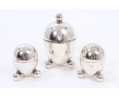 Victorian three piece silver condiment set - comprising salt, pepper and mustard of ovular form, on three ball feet, in the m