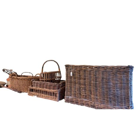 Collection of wicker baskets, carpet beater, brass jam pan and copper mast head lamp.