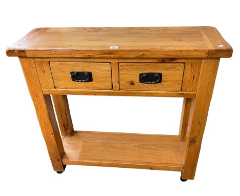 Oak two drawer console table with undershelf, 86cm by 91cm by 31cm.