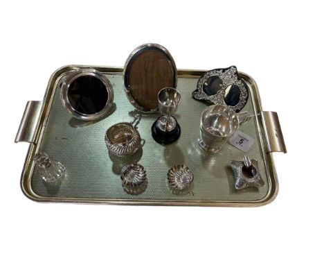 Collection of silver including three photograph frames, small tankard, jug, trophy, salts, etc.