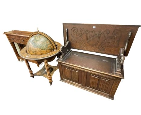 Oak linen fold panel monks bench, globe cocktail cabinet and hardwood two drawer console table (3).