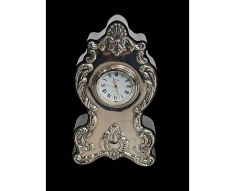 R Carr silver and ebonised clock.