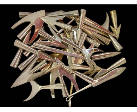Collection of silver arrow heads.