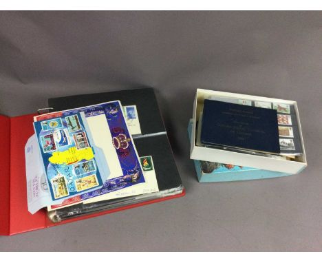 THREE FOLDERS OF BRITISH AND COMMONWEALTH STAMPS,along with two boxes of loose stamps, and a folder of first day covers