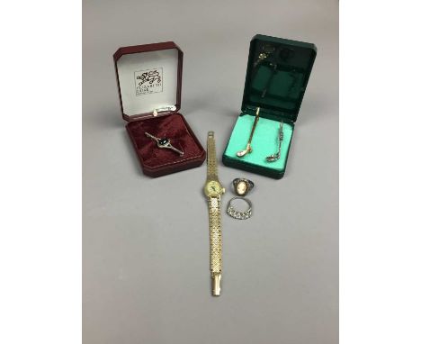 COLLECTION OF COSTUME JEWELLERY,including silver examples, comprising two rings, two stick pins modelled as golf clubs, a bro