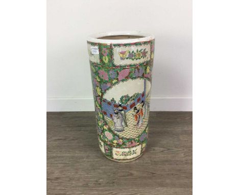 LATE 20TH CENTURY CHINESE STICK STAND,with figural decoration, 48cm high