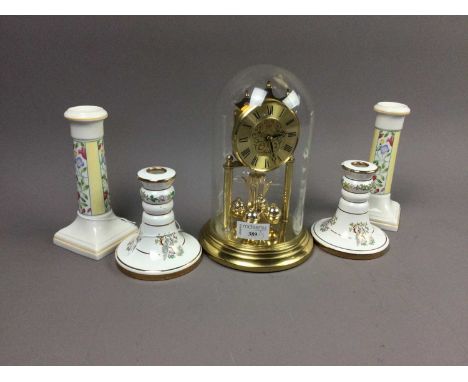 ACCTIM ANNIVERSARY CLOCK,23cm high, along two pairs of ceramic candlestick holders, a pair of elephant figurines, and a teali