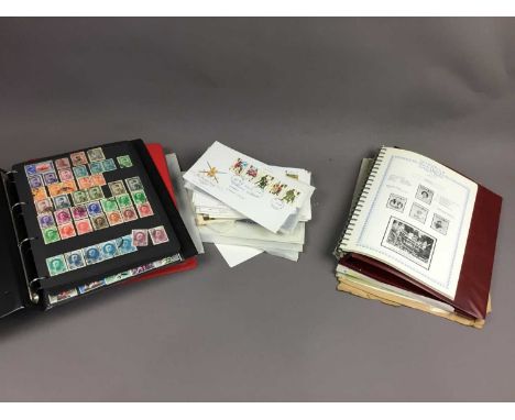 FOLDER OF BRITISH FIRST DAY COVERS,along with a folder of international stamps, another folder, also assorted first day cover