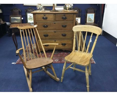 ERCOL OAK ROCKING ARMCHAIR,along with a spindle back kitchen chair (2)