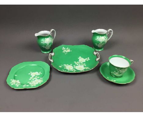 NORITAKE PART TEA SERVICE,comprising seven cups, eight saucers, twelve side plates, two biscuit plates, two cream, 31 pieces 