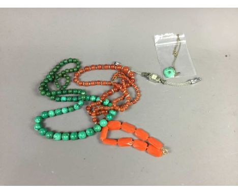 JADE EFFECT PENDANT NECKLACE,the pendant modelled as a bi disc, along with two beaded necklaces and a beaded bracelet, also a