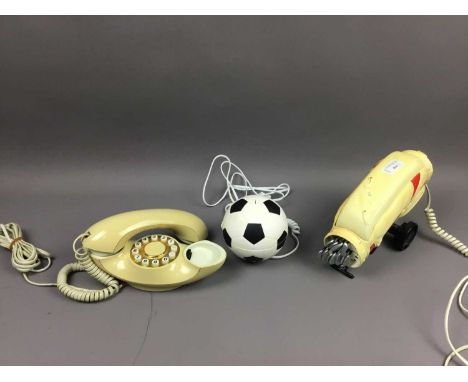 THREE VINTAGE NOVELTY TELEPHONES,one modelled as a golf bag and clubs (3)