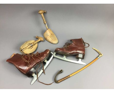 ENSIGN CAMERA,along with a riding crop, ice skates, a section of Harris tweed fabric, and two vintage clear glass bottles