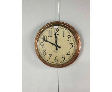 EARLY 20TH CENTURY WALL CLOCK BY INTERNATIONAL TIME RECORDING COMPANY LTD.,56cm diameterCondition report: The backing is scre