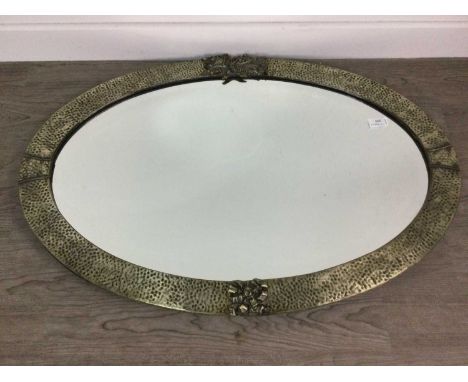 OVAL WALL MIRROR,in beaten metal frame, 81cm wide