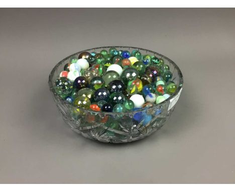 COLLECTION OF VINTAGE GLASS MARBLES,including German examples, contained in a crystal bowl