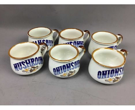 DELPHINE PART TEA SERVICE,decorated with gilt on a pale blue and white ground, along with a set of six mugs and saucers, labe