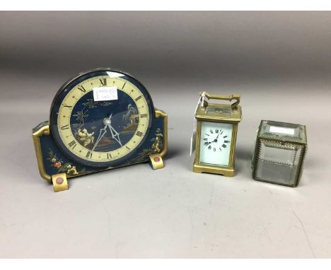 EDWARDIAN CARRIAGE CLOCK,contained in a brass and bevelled glass case, along with a 'chinoiserie' mantel clock and a small Vi