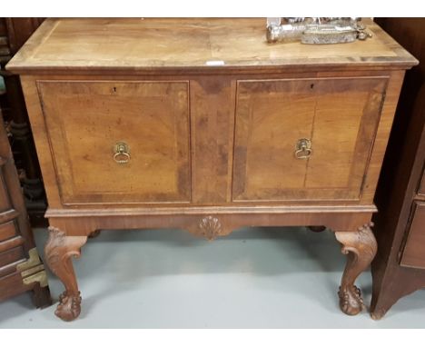 Mahogany Low Side Cabinet, with two crossbanded doors enclosing 1 shelf, on ball and claw feet, 36”w x 17.5”d x 32”h