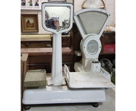 Two Enamel Shop Counter Weighing Scales – 1 Avery & 1 Lion, with pans (2)