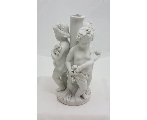 Bisque Porcelain Ornament with 3 Putti disporting round a tree trunk - small chip, Height 25cms and width 12cms