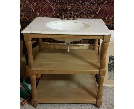 Oak framed 3 tier washstand with white marble top and oval ceramic basin, brass taps (one corner damaged), 32"w x 24"d x 35"h