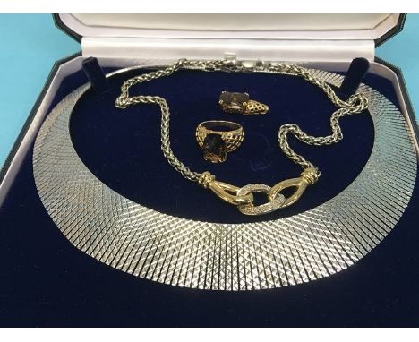 A silver gilt ring and pendant, silver necklace and a silver necklace with '9k' pendant