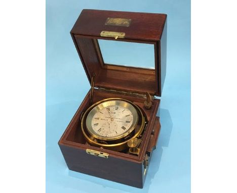 A 20th century German two day marine chronometer by Wempe, Hamburg, no. 203, bears label to mahogany case, retailed by Gebr. 