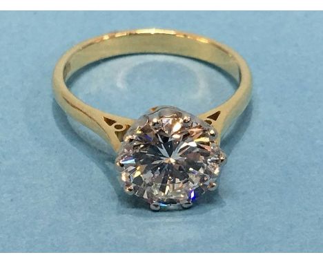 An 18ct gold diamond solitaire ring, the brilliant cut diamond, colour I/J, clarity VS1/VS2, estimated weight 2.2 carat