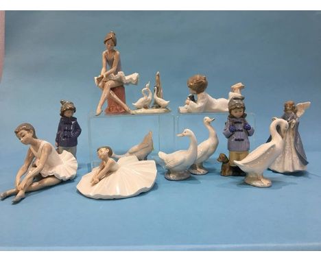 Twelve Lladro and Nao figures, various