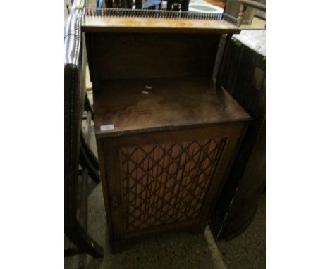 REGENCY TYPE NARROW SIDE CABINET WITH BRASS GALLERIED BACK WITH SPINDLE SUPPORTED SHELF WITH SINGLE GRILLE FRONTED DOOR RAISE