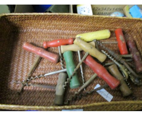BASKET CONTAINING VINTAGE CORKSCREWS 
