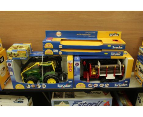 Bruder JD logging tractor and trailer, pipes etc